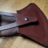 Leather sheath for axe head from Vermont Racing Axes, Barnet, Vermont